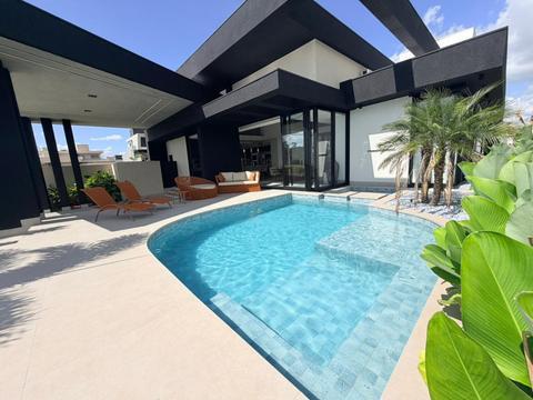 Casa de alto padrão em Porto Rico com 5 suítes, 6 banheiros, Home theater, adega, piscina, área gourmet e mobiliado